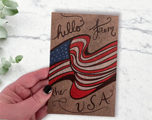 Load image into Gallery viewer, MN John Hello from the USA Postcards on a Marble Background